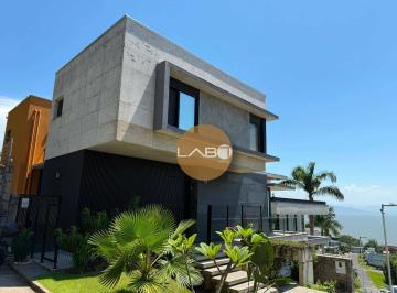 2dde59278bb7b63907c6d65931e119f8bc8cf975 · Casa  vista mar 3 dormitórios sendo 3 suítes