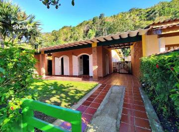 e7ee4897866debf38cb4e18a7b61ae422362f7ed · Casa à venda com 3 dormitórios - Condomínio com segurança e lazer - Jardim Albamar, Guarujá/SP