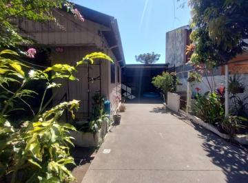 679818_ib2tYT_67981867a4d904a40da.jpg · Terreno á venda com Casa e Pavilhão no Bairro Medianeira em Santa Maria - Ideal para Moradia e Traba