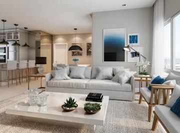 Living integrado decorado com cozinha americana (imagem ilustrativa da Embraed) · Apartamento à venda no Ed. Hamptons em Balneário Camboriú