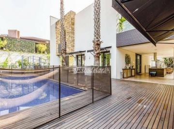 0d4eb072241fe1797e7e8636ad231a6224bc098e · Casa com projeto de Arthur Casas e paisagismo de Gil Fialho em Jardim Europa - São Paulo - SP