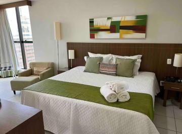 QUARTO · Vende amplo Flat mobiliado, com garagem, para morar ou alugar.