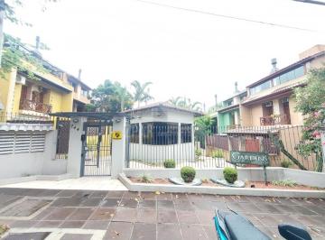 Foto 01 · Imponente residência em condomínio à venda em Porto Alegre-RS, bairro Tristeza - 4 quartos, 3 suítes