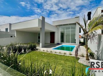 3906a6b38ff8cdeaa2df401dc59894a5313e0dd6 · Casa com 3 dormitórios à venda, 136 m² por R$ 1.189.000,00 - Bellatorres - Passo de Torres/SC