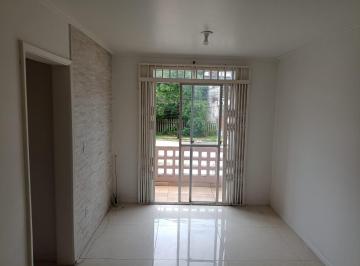 Sala c/ acesso a sacada · Apto com 2 dorm, 63m² c/ sacada, bom estado, churrsqueira no cond. box coberto