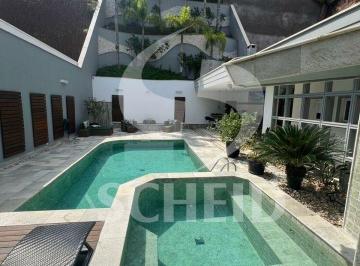 Casa · 560m² · 5 Quartos · 5 Vagas · Casa de alto padrão à venda no Cond. Swiss Park com 4 suítes, 5 vagas de garagem, piscina aquecida.