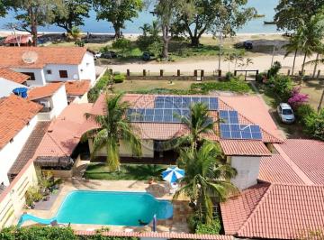 Casa · 615m² · 5 Quartos · 6 Vagas · Casa Frente Praia – Um Paraíso na Região dos Lagos!
