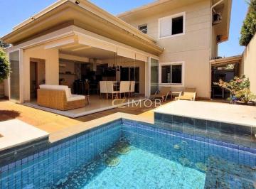 c6058cbab3a70d77a56ecd5e8e272c385772f62f · Sobrado de Alto Padrão à Venda no Condomínio Laranjeiras – 3 Suítes, Piscina Aquecida, Varanda Gour