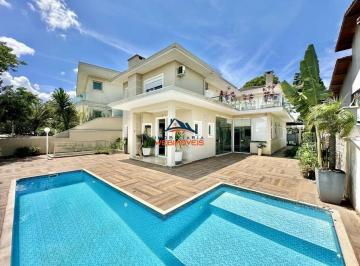 Foto 01 · Casa de luxo em condomínio Golf Gardens em Carapicuíba-SP: 4 quartos, 2 suítes, 3 salas e 3 vagas de