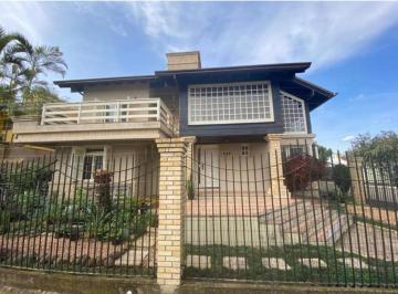 690237_i6KY5K2NKA5cx2vG_69023767bf4f0652944.jpg · Lindo sobrado à venda em Canoas, é uma residência espaçosa e encantadora, perfeita para quem procur