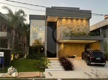 Área de Serviço · Casa com 6 quartos à venda em Riviera - SP