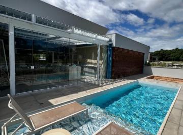 Foto 31 · Casa com piscina e área gourmet em Condomínio Fechado em Criciúma