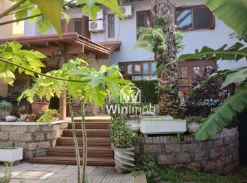 1b9ed30c06d5ebe14a3ea7e3a2196d1a31deb2ee · Casa à venda, 197 m² por R$ 900.000,00 - Condomínio Cantegril - Viamão/RS