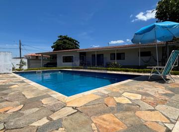 Foto 02 · Casa de Luxo à Venda em Itanhaém-SP, Santa Terezinha - 4 quartos, 4 suítes, 6 banheiros, 327m² de ár