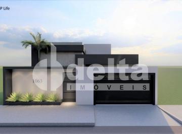 NULL · Casa residencial disponível para venda no bairro Laranjeiras em Uberlândia-MG