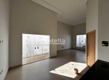 NULL · Casa residencial disponível para venda no bairro Laranjeiras em Uberlândia-MG
