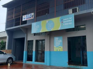 Comercial de 4 quartos, Porto Alegre · Sobrado com loja alugada em Porto Alegre