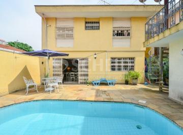 Casa · 273m² · 5 Quartos · 2 Vagas · Casa á Venda no Campo Belo com 273m², 5 quartos sendo 2 suítes, 2 vagas.
