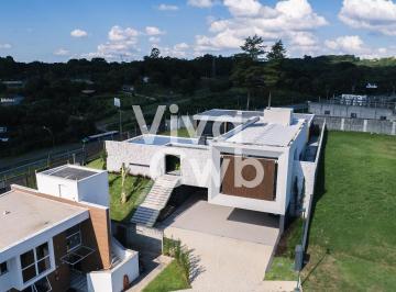 1 · Casa de condomínio com 517m², 4 suítes e 8 Vagas à venda no bairro Riviera.