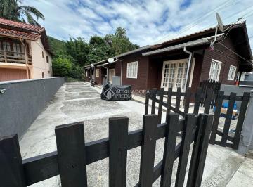 693738_i1O44_69373867d0b5972dfc3.jpg · Oportunidade Imperdível: Terreno com 3 Casas de Aluguel no Ribeirão da Ilha!