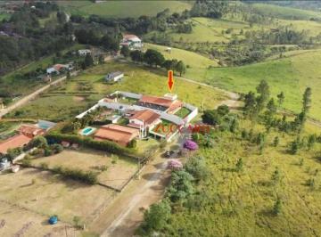 b31a7f1e30ab24c23aba58018f91e71716cc51d7 · Casa com 6 dormitórios à venda, 684 m² por R$ 715.000,00 - Centro - Igaratá/SP