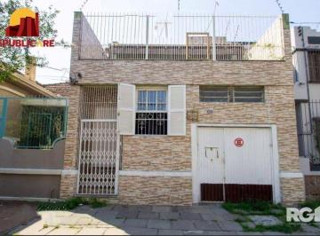casa-fachada · CASA A VENDA NA OLAVO BILAC, 3 DORMITÓRIOS.