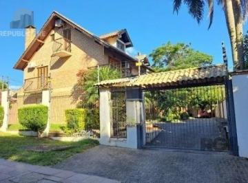 Casa · 268m² · 4 Quartos · 2 Vagas · Casa em condomínio em Ipanema de 3 dormitórios e 2 vagas