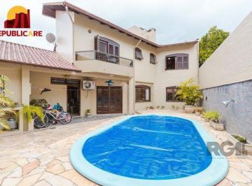 Casa · 295m² · 4 Quartos · 2 Vagas · Casa com 4 dormitórios no bairro Morro Santana