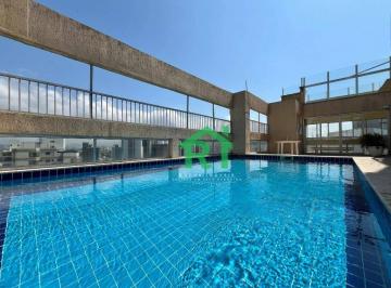 Piscina · Apartamento á venda na Praia das Astúrias | Rocha Imóveis Guarujá
