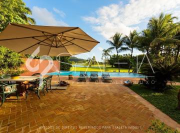 Casa · 4 Quartos · 4 Vagas · Lindíssima residência com golfe no quintal e vista sensacional para o lago à venda no Guarujá Golf C