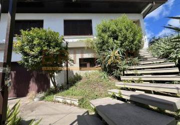 922e435b436b48e1d7f1c5b2699889a74afb06cb.jpg · Casa 03 dormitórios comprar bairro Petrópolis