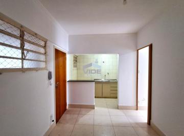 SALA COM VISÃO DA COZINHA E PORTA · KITNETÃO SEM GARAGEM PARA VENDA NA VILA ITAPURA EM CAMPINAS/SP