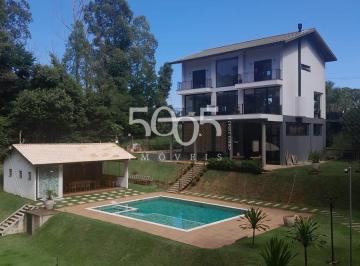 Foto 01 · Casa de condomínio para locação com 4 quartos, sendo 2 suítes, e 3 salas amplas e arejadas, com 680m
