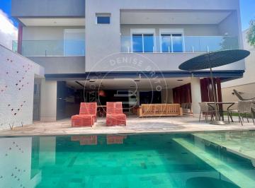 Casa · 440m² · 4 Quartos · 4 Vagas · Sobrado de alto padrão no Alphaville Flamboyant com 4 suítes, lazer completo e pé-direito duplo
