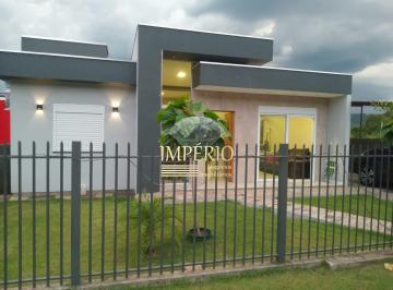 Foto 01 · Casa com Piscina e Ótima Localização em Três Coroas!
