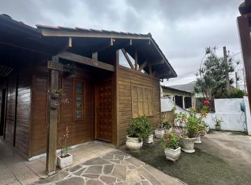 Casa · 130m² · 3 Quartos · 4 Vagas · VILLARINHO VENDE LINDA CASA DE MADEIRA NOBRE COM 3 DORM. SUITE E GARAGEM NA MEL