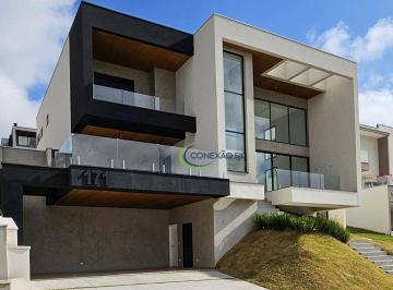 c749aed23370ab0b8a48ff21579bf62c65f71695 · Sobrado com 4 dormitórios à venda, 415 m² por R$ 4.800.000,00 - Condomínio Reserva do Paratehy - São
