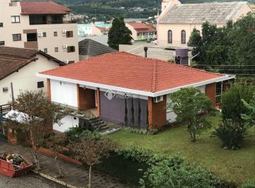 Casa · 200m² · 3 Quartos · 2 Vagas · A Auxiliadora Predial vende casa no centro de Dois Irmãos!