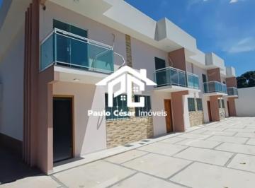 Foto 01 · Casa em Vila à Venda em Araruama-RJ: 2 quartos, 2 suítes, 2 salas, 1 banheiro, 90m² na Praça da Band