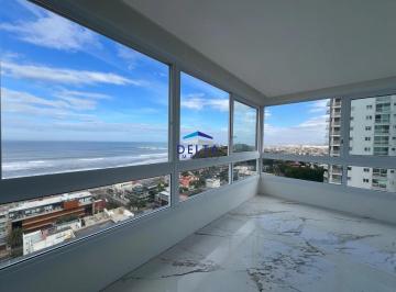 Sala de estar · Apartamento de 3 suítes à venda na Prainha em Torres/RS