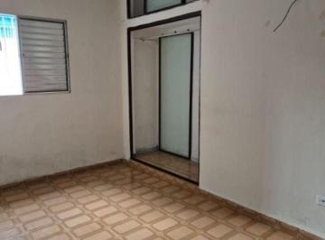 Foto 1 · Casa com uma suíte, 2 vagas de garagem e churrasqueira na vila Tupi