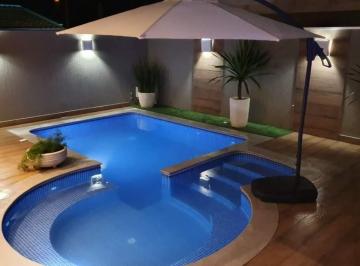 Casa · 404m² · 3 Quartos · 3 Vagas · Casa com 3 suítes à venda no Condomínio Terras de Jupiá em Três Lagoas - MS | Elegância e sofisticaç