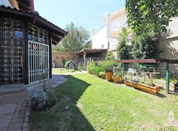 368804_in278c38T_36880462436caa69909.jpg · Excelente casa em condomínio fechado localizada no bairro Nonoai