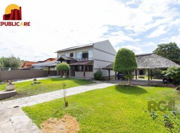Casa · 256m² · 4 Quartos · 3 Vagas · Com 4 dormitórios, incluindo uma suíte, é perfeita para acomodar toda a sua famí