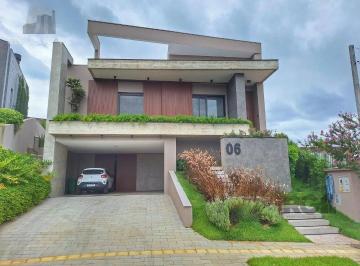 Casa · 390m² · 3 Quartos · 5 Vagas · Casa mobiliada com 3 suítes no Condomínio Alphaville Gravataí
