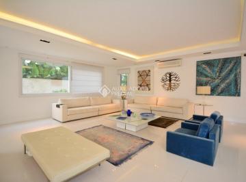 Casa · 1100m² · 9 Quartos · 4 Vagas · Luxuosa Mansão à Venda em Jurerê Internacional - Exclusividade e Sofisticação!