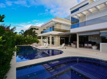 Casa · 1100m² · 9 Quartos · 4 Vagas · Luxuosa Mansão à Venda em Jurerê Internacional - Exclusividade e Sofisticação!