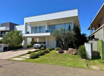 Casa · 444m² · 4 Quartos · 4 Vagas · Residência Exclusiva com 4 Suítes, Piscina e Alto Padrão de Acabamento