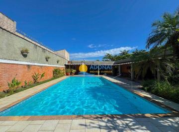 d66cc65f9489b3526fb7fbfaac7217c77c6d05eb · Casa próximo à praia com lazer — Enseada — Guarujá