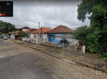 Casa · 250m² · 2 Quartos · 1 Vaga · Terreno com 3 casas, no bairro Cristo Redentor, em Porto Alegre, RS.